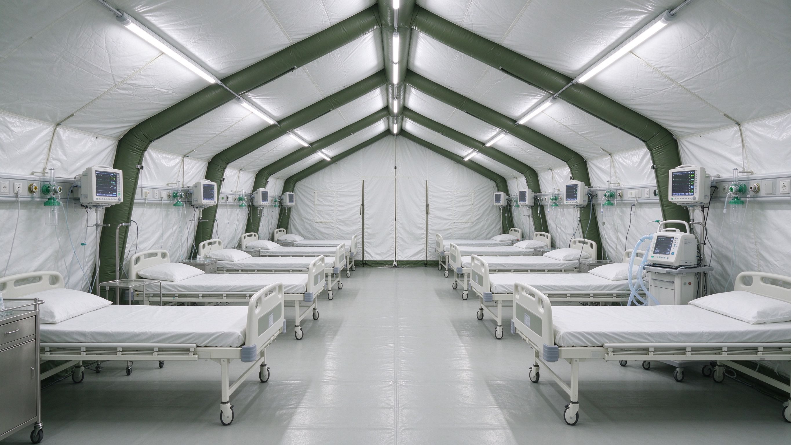 Interior of an inflatable ward with beds and medical gas outlets