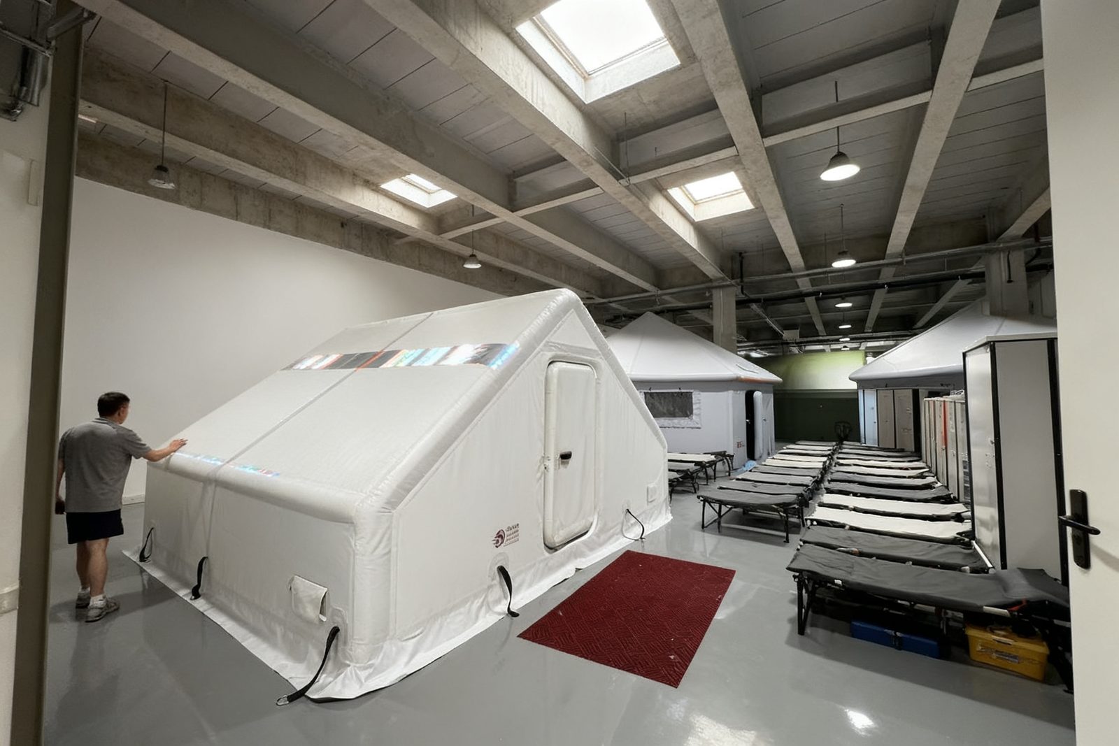 Interior of the disaster relief shelter, furnished and in use